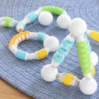 Guidecraft Grippies Shake - Build and Curve - Set of 70-Material: Soft plastic over-molded ABS plastic rods and metal balls