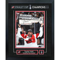 Frameworth Taylor Hall 16" H x 20" W Replica Signature Frame Carolina Hurricanes 2026 Stanley Cup Champions - Officially Licensed NHL/NHLPA-Officially licensed NHL and NHLPA wall art: Taylor Hall 16x20 Replica Signature Frame Carolina Hurricanes 2026 Stanley Cup Champions for Carolina Hurricanes fans and collectors
