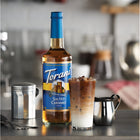 Torani Sugar Free Salted Caramel Syrup with Pump - 750 mL-Pump included: Dispenses the perfect amount (1/4 oz) of syrup every time