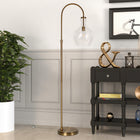 Hudson&Canal Verona Arc Floor Lamp with Glass Shade - Brass/Clear-Handcrafted brass finish is applied to the round metal base