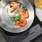 Tramontina Gourmet Tri-Ply Clad 30 cm Fry Pan-The fry pan is NSF-certified, meeting the highest standards for safety and quality. Designed for use in both home and professional kitchens, it's compatible with all cooktops, including gas, electric, ceramic glass, and induction. It's oven-safe up to 500°F, allowing you to easily transfer it from stovetop to the oven for finishing dishes. The stainless steel handle is securely riveted for a comfortable, firm grip, and features a Seattle-style design with a squa
