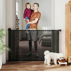 PawHut Retractable Dog Gate - Extends to 55" W-Simple one-handed operation allows for easy passage when your hands are full
