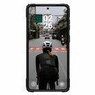 UAG Plasma XTE Rugged Kickstand Cell Phone Case with Magnets for Galaxy S26+ - Black/Orange-Eco: Black TPU Made of Recycled Material