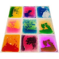 Kore Design Liquid Floor Tiles - Assorted Colors - Squares - 12" x 12" x 0.2" - Set of 9-Dance, play, and learn: These sensory Disc Tiles enclosed in liquid are durable, tear-resistant, and leak-resistant, ensuring resilience against games, dancing, and hopping. With a non-slip backing, they stay securely in place during play