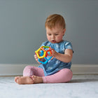 The Original Toy Company Baby What'zit Sensory Toy-Versatile Playtime: Whether during tummy time, playdates, or quiet moments of exploration, Baby What'zit offers versatile play opportunities for infants. Its portable size and lightweight design make it easy for little ones to carry and manipulate wherever they go