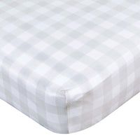 Gerber Childrenswear Knit Crib Sheet - Celestial - Checker-Crafted from a durable blend of polyester and stretchy spandex jersey, this sheet ensures a snug fit on standard crib mattresses, measuring 52 x 28