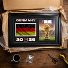 Frameworth Official FIFA World Cup 2026 Germany Flag & Trophy Framed Print - 15" x 24"-Handcrafted in Canada by Frameworth Sports Marketing, established 1992, producing officially licensed sports memorabilia.