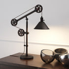 Hudson&Canal Descartes 29" Tall Pulley System Table Lamp with Metal Shade - Blackened Bronze/Blackened Bronze-Handcrafted blackened bronze finish is applied to the round adjustable metal base