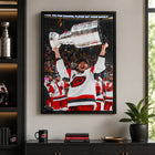 Frameworth Sebastian Aho 20" H x 29" W Framed Canvas Carolina Hurricanes 2026 Stanley Cup Champions Framed Canvas - Officially Licensed NHL/NHLPA-Professionally framed in Canada: The image is printed on high-quality art canvas, professionally stretched, and presented in a premium black frame