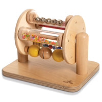 Learn Well Sight and Sound Drum-This stimulating Sight and Sound Drum features four individual tubes which each enclose a different visually engaging material, as well as featuring a set of clacking wooden spheres