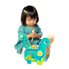 Manhattan Toy Musical Diego Dino Wood Toy-Noise-making ridges on neck and back