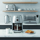 Salton NuRetro Digital 12 Cup Coffee Maker - Space Cherry-Wake up to freshly brewed coffee! Schedule your coffee in advance with the easy to program digital display. 