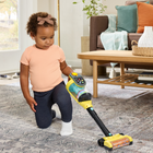 VTech 4-in-1 Push & Play Vacuum -The Star Button cycles through songs and games when a break is needed from all that helping