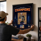 Frameworth New York Knicks 2026 Champions: Jalen Brunson Trophies PhotoGlass Framed Photo - 18" W x 22" H - Orange-Finished size 18x22 inches: Vertical framed display sized for living rooms, offices, fan caves, and sports rooms