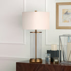 Hudson&Canal Rowan 28" Tall Table Lamp with Fabric Shade - Antique Brass/White-Handcrafted antique brass finish is applied to the cylinder metal and glass base
