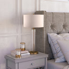 Hudson&Canal Harlow 29" Tall Table Lamp with Fabric Shade - Clear Glass/Brass/White-Handcrafted clear glass and brass finish is applied to the cylinder metal and glass base