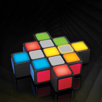 Rubik's Rush Electronic Game-Light-up sequence game: rush to complete a 3-in-a-row sequence of lines that shift from vertical & horizontal to diagonal, increasing the challenge as the game progresses, by pressing the correct tile