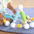 Guidecraft Grippies Shake - Build and Curve - Set of 70-Variety of tactile grips on rods featured in soft, over-molded plastic textures and four bright colors