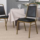 Flash Furniture HERCULES Series Trapezoidal Back Stacking Banquet Chair in Black Vinyl - Gold Frame-Upholstered Seat and Back