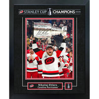 Frameworth Nikolaj Ehlers 16" H x 20" W Replica Signature Frame Carolina Hurricanes 2026 Stanley Cup Champions - Officially Licensed NHL/NHLPA-Officially licensed NHL and NHLPA wall art: Nikolaj Ehlers 16x20 Replica Signature Frame Carolina Hurricanes 2026 Stanley Cup Champions for Carolina Hurricanes fans and collectors