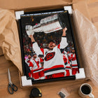 Frameworth Sebastian Aho 20" H x 29" W Framed Canvas Carolina Hurricanes 2026 Stanley Cup Champions Framed Canvas - Officially Licensed NHL/NHLPA-Frameworth quality: Made in Canada by Frameworth Sports Marketing, established 1992, producing officially licensed sports memorabilia