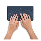 Logitech Keys-To-Go Bluetooth Keyboard for iPhone, iPad, and Apple TV - Blue-Sealed keyboard protects against crumbs, spills, and almost anything else you (or your kids) can throw at it
