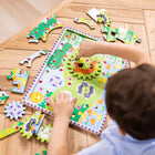 Melissa & Doug 24-Piece Wooden Animal Chase Jigsaw Spinning Gear Puzzle-Artwork on wooden puzzle board under pieces for easy matching