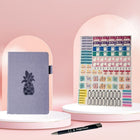 Wamaco Pineapple Planning Essestial Collection - Purple Undated Planner, Stickers, Pen-Professional – Our Planner Essentials Collection adds a beautiful touch to all its uses. The ball point pen writes smoothly and the stickers helps to draw attention to important days and commitments.