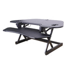 Rocelco 46" Adjustable Sit/Stand Corner Desk Riser with Dual Monitor Mount - Black -Raises 18” above desk surface and lowers to 5”