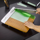 Westcott CarboTitanium 12" Guillotine Trimmer-Alignment grid and on-board measurements in US and metric for precise measuring and accurate trimming