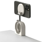 iOttie Treker MagSafe Compatible Travel Mount for Mobile Phones- White-Adjustable Viewing: Multi-angle viewing lets you find the perfect way to watch in portrait or landscape mode. Pull the mounting face to extend the arm, slide the tabs to open the spring-loaded bracket, and attach it to a tray table or bag handle. You can also place the mount on any flat surface for hands-free use anywhere
