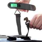 Travelon Transit Rechargeable Luggage Scale - Black-Utilizes high-precision sensing technology has a measuring capacity up to 110 lb/50kg and avoid unexpected overweight charges, and the data lock gives you more time to read the results before returning to zero. A backlit HD LCD display is visible even in dimly lit environments. Turns off when not in use