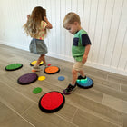 Kore Design Sensory Game Tiles - Assorted Colors - Two Sizes 10.23" & 4" - Classic Colors - Set of 14-Perfect size for kids to use: Large Circles are 10.23" and the Small Circles are approximately 4", providing the perfect size for kids to use. These tactile Discs are easily stored for prolonged use