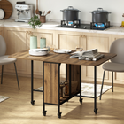 HOMCOM 51" Mobile Wheel Drop Leaf Folding Dining Table with Storage Shelf for 6 - Brown Wood Grain-Hidden central storage shelf keeps essentials organized