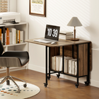 HOMCOM 51" Mobile Wheel Drop Leaf Folding Dining Table with Storage Shelf for 6 - Brown Wood Grain-Smooth melamine coating resists scuffs and is easy to clean