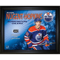 Frameworth Ryan Nugent-Hopkins Edmonton Oilers PhotoGlass with Game-Used Net - 20" W x 16" H-Officially licensed by the NHL and NHLPA featuring Ryan Nugent-Hopkins - 1st overall pick in 2011 and longtime Edmonton Oilers team leader