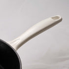 Tramontina Bestow 12" Enameled Cast Iron Skillet with Lid - Sunrise with Stainless Steel Knob-Self-basting condensation ridges on lid uniformly collect and direct vapors onto food