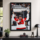Frameworth Taylor Hall 20" H x 29" W Framed Canvas Carolina Hurricanes 2026 Stanley Cup Champions Framed Canvas - Officially Licensed NHL/NHLPA-Professionally framed in Canada: The image is printed on high-quality art canvas, professionally stretched, and presented in a premium black frame