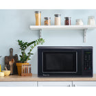 Magic Chef 0.9 cu. ft. 900W Countertop Microwave - Black-Convenient auto defrost modes by weight or time