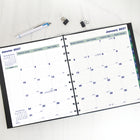 Blueline 2027 MiracleBind 16-Month Monthly Planner with Twin-Wire Binding - 10-3/4" x 8-1/2" - Black - Bilingual-Page Size: 10-3/4'' H x 8-1/2" W