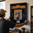 Frameworth New York Knicks 2026 Champions: Jalen Brunson Trophies PhotoGlass Framed Photo - 18" W x 22" H - Black-Finished size 18x22 inches: Vertical framed display sized for living rooms, offices, fan caves, and sports rooms