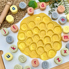 Yellow Door Alphabet Stamping Stones - Lowercase-Perfect for small hands, the position dots on these chunky stones help children identify letters the correct way round, and act as ‘sound button’ prompts when sounding out each letter