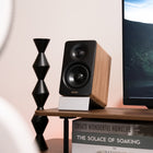 Edifier M60 Hi-Res Wireless Audio Touch Control Multimedia Bluetooth Speaker - Classic Oak-Exclusive aluminum speaker stands that minimize sound coloration from desktop reflections. With a 15-degree angle, they direct sound precisely at ear level for an optimal experience.