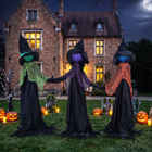 HOMCOM 4' Holding Hands Witch Trio Stake with Light-Up Heads - Multicoloured-Outdoor waterproof battery compartment features a simple button switch for wet autumn conditions 