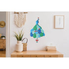 Enesco Allen Designs Pastel Coloured Peacock Pendulum Wall Clock-Hand crafted from high-quality resin material that is hand-painted by skilled artisans and packaged in a kraft gift box