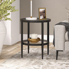 Hudson&Canal Hera 20"W Round Side Table with Glass Shelf - Blackened Bronze-Handcrafted finish is applied to the steel frame