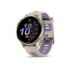 Garmin Forerunner 970 Smartwatch - Soft Gold Titanium with French Grey Case and French Grey/Translucent Indigo Band-PREMIUM DESIGN - Our brightest AMOLED touchscreen display with button controls, a lightweight titanium bezel and sapphire lens, plus a built-in LED flashlight for greater awareness in the dark during early morning or late-night runs.