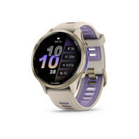 Garmin Forerunner 970 Smartwatch - Soft Gold Titanium with French Grey Case and French Grey/Translucent Indigo Band-PREMIUM DESIGN - Our brightest AMOLED touchscreen display with button controls, a lightweight titanium bezel and sapphire lens, plus a built-in LED flashlight for greater awareness in the dark during early morning or late-night runs.