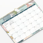 Blueline 12 Month Monthly Academic Wall Calendar - August to July - 15" H x 12" W - Splash Design - Bilingual-Gold twin-wire binding, eyelet to suspend