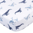 Gerber Childrenswear Knit Crib Sheet - Coastal Calm - Whales-Crafted from a durable blend of polyester and stretchy spandex jersey, this sheet ensures a snug fit on standard crib mattresses, measuring 52 x 28